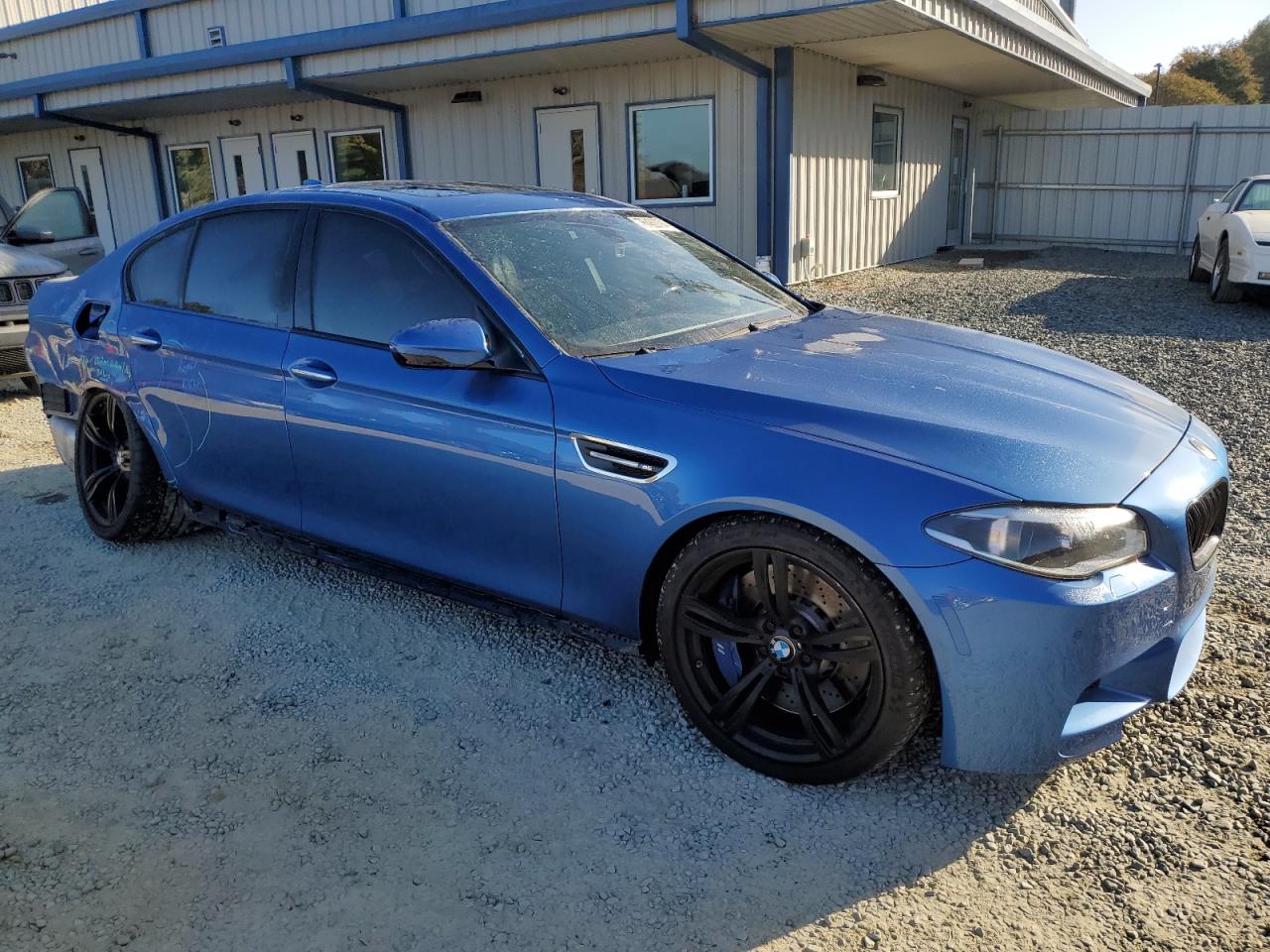 2016 BMW M5 VIN WBSFV9C53GG343466 Copart auction photo, all over damage thumbnail 4