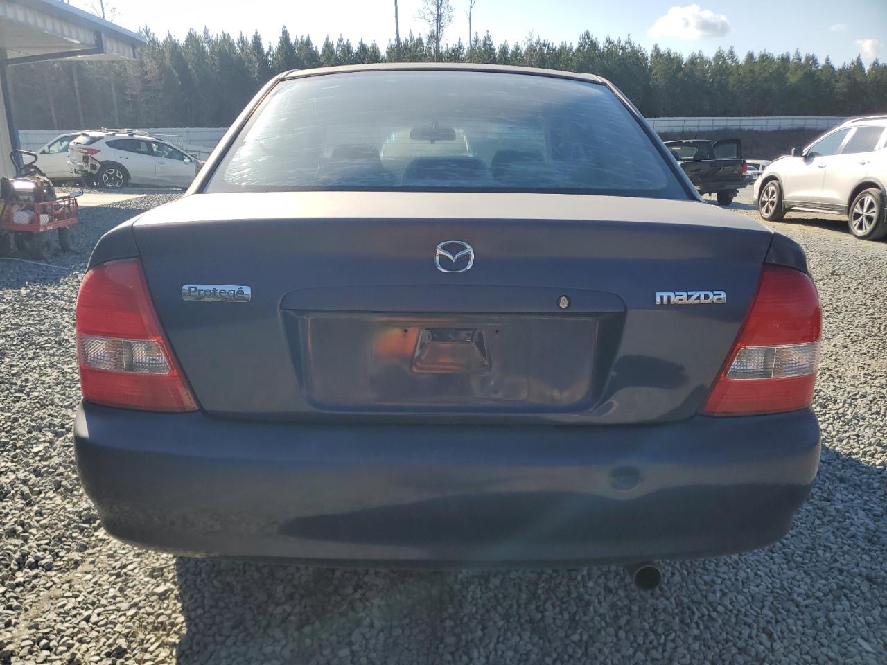 2000 Mazda Protege VIN JM1BJ2222Y0303549 Copart auction photo, front end / minor dent/scratches damage thumbnail 6
