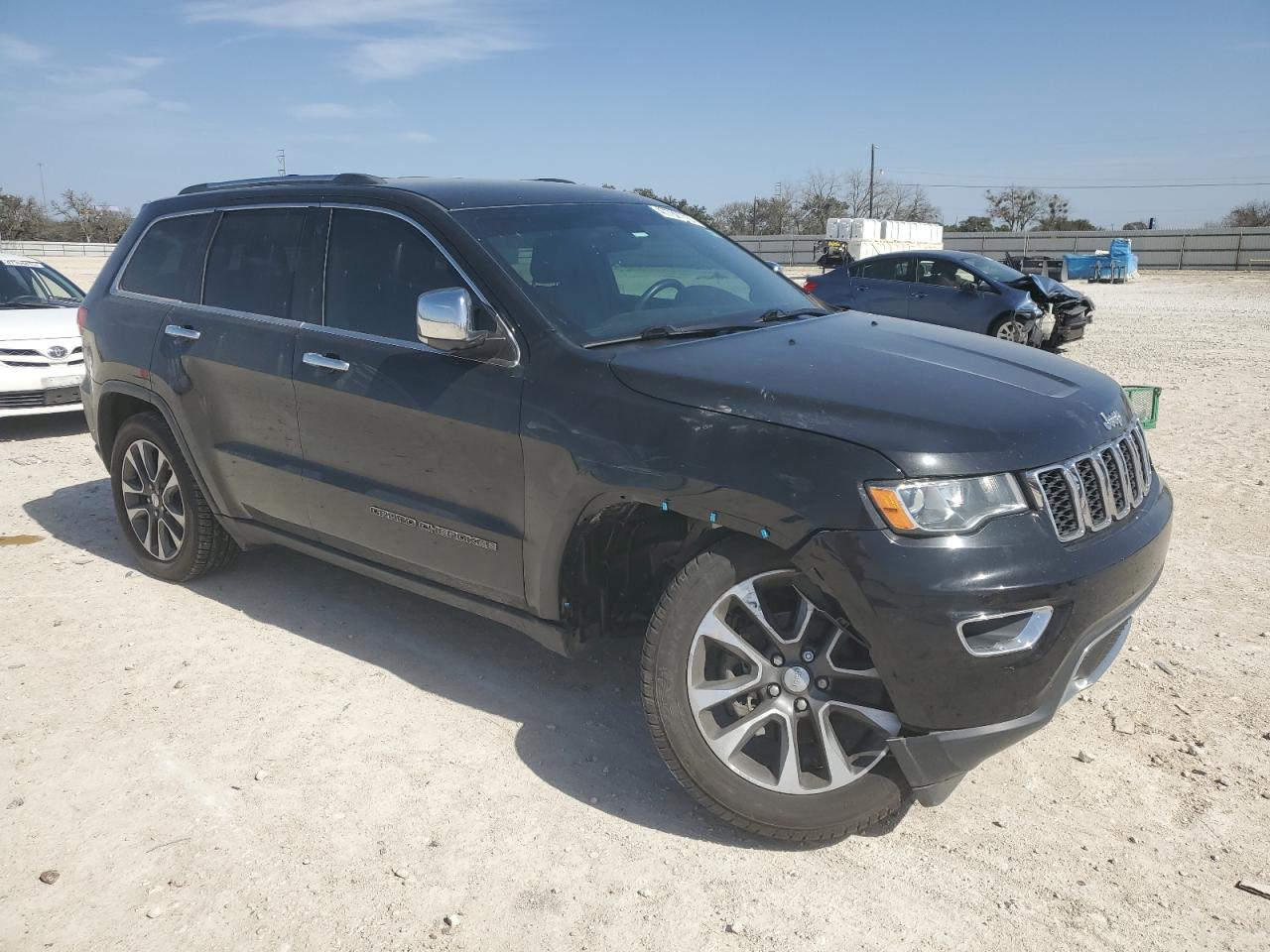 2018 Jeep Grand Cherokee VIN 1C4RJEBG5JC182466 Copart auction photo, front end / side damage thumbnail 4