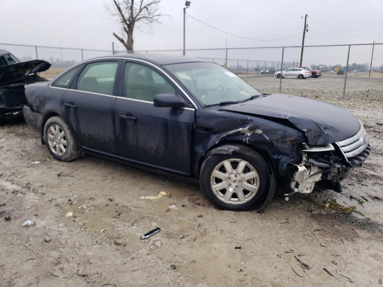 2009 Ford Taurus VIN 1FAHP23WX9G110767 Copart auction photo, front end / all over damage thumbnail 4