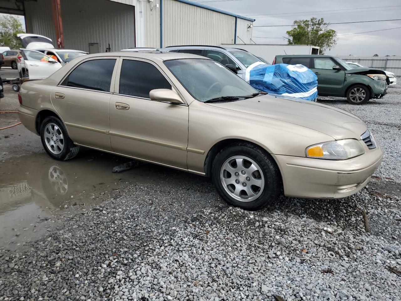 2001 Mazda 626 VIN 1YVGF22CX15238033 Copart auction photo, rear end damage thumbnail 4