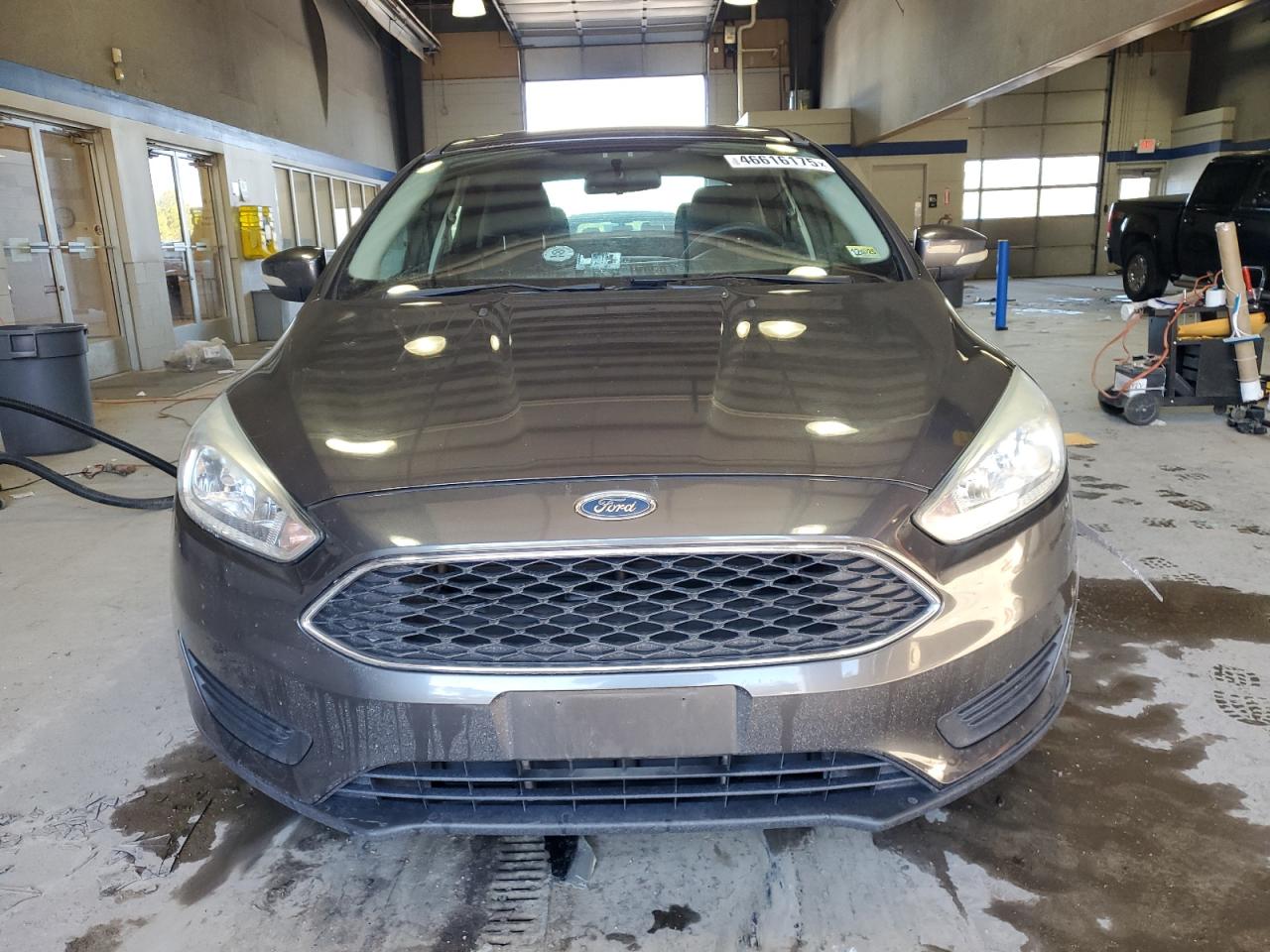 2016 Ford Focus VIN 1FADP3F26GL237033 Copart auction photo, front end / side damage thumbnail 5