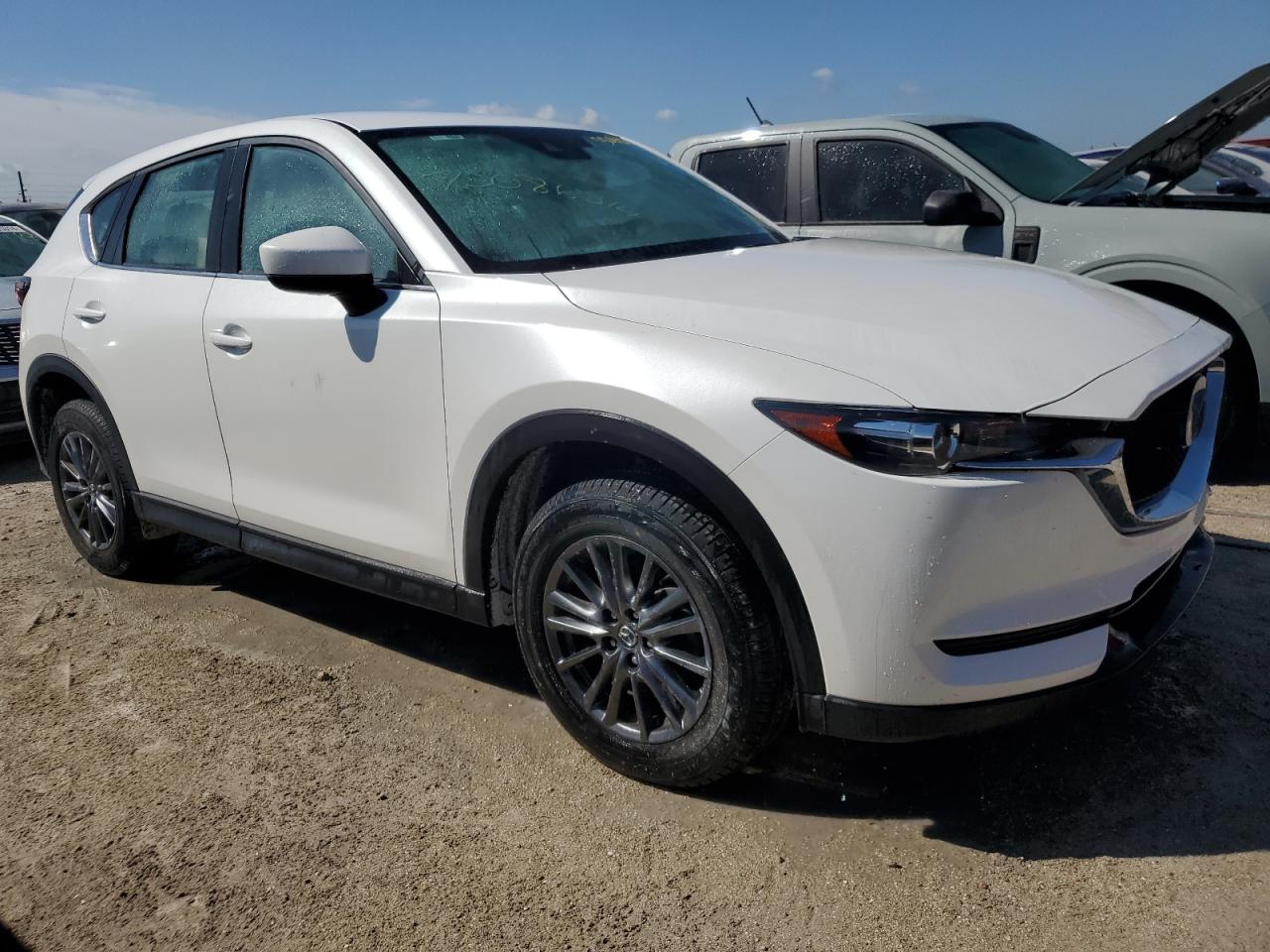 2021 Mazda CX-5 VIN JM3KFABM0M0383996 Copart auction photo, water/flood damage thumbnail 4