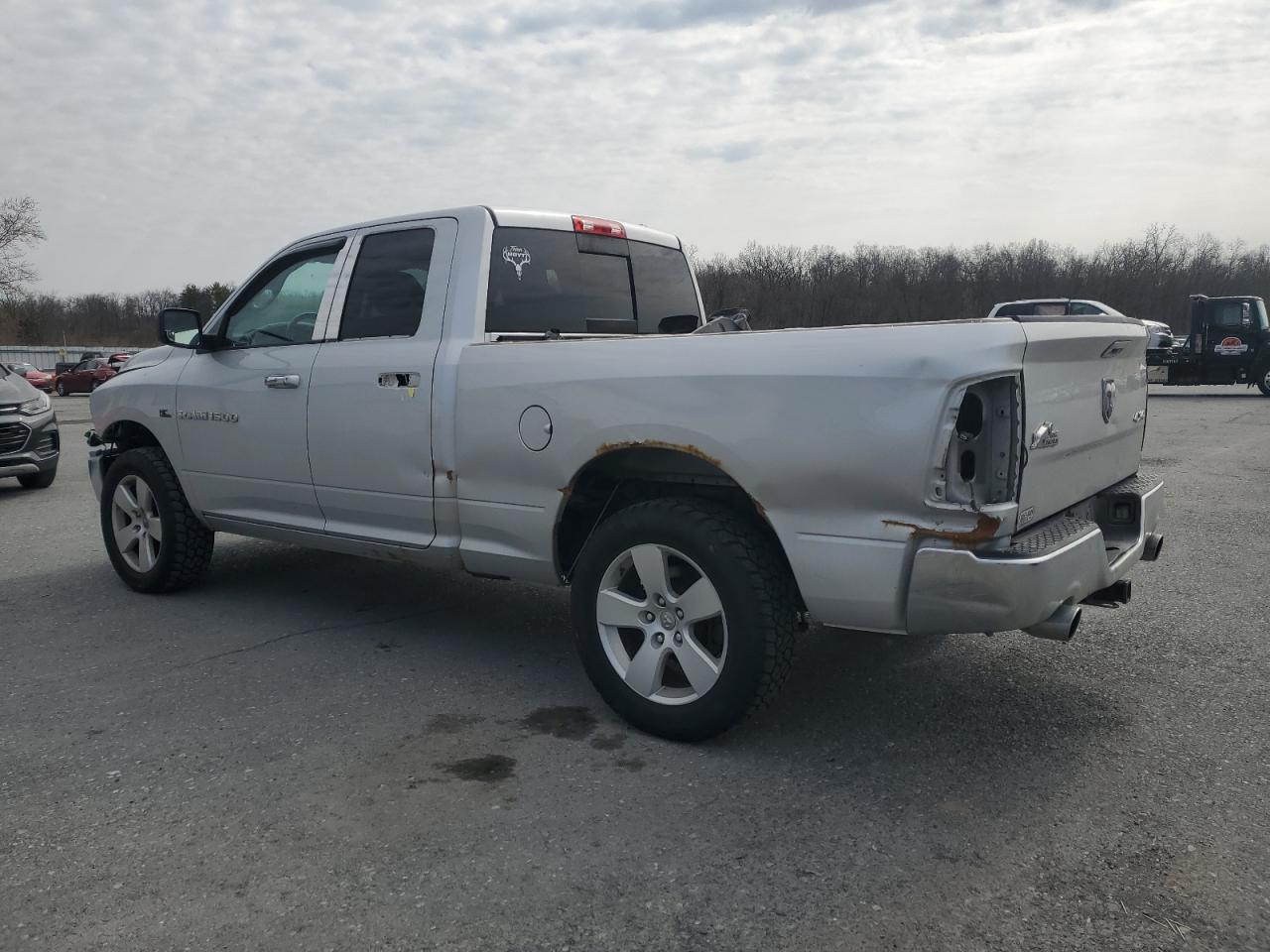 2011 Dodge RAM VIN 1D7RV1GT9BS704435 Copart auction photo, front end / rear end damage thumbnail 2