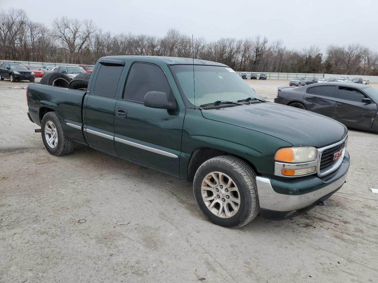 2001 GMC Sierra VIN 2GTEC19T711194578 Copart auction photo, side / minor dent/scratches damage thumbnail 4