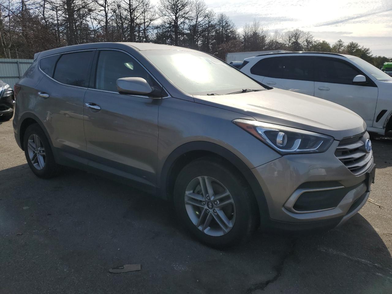 2018 Hyundai Santa Fe VIN 5NMZTDLB5JH053426 Copart auction photo, undercarriage / minor dent/scratches damage thumbnail 4