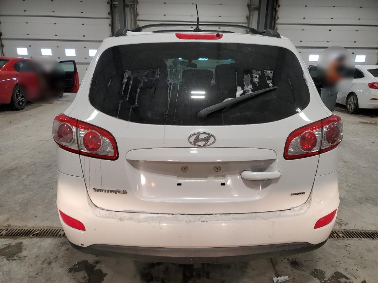 2012 Hyundai Santa Fe VIN 5XYZGDAB3CG141332 Copart auction photo, front end damage thumbnail 6