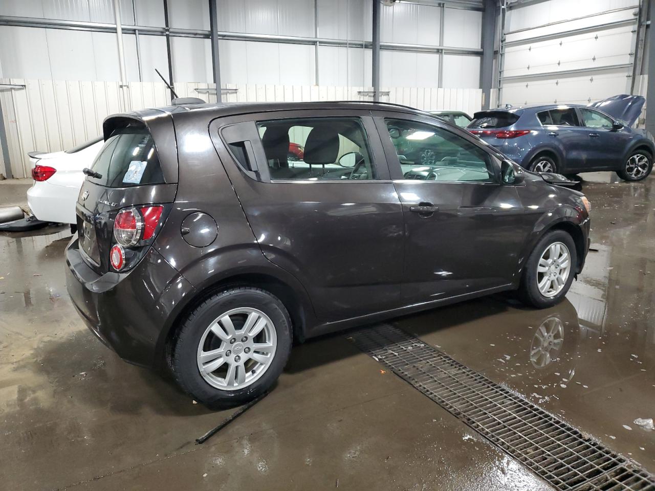 2015 Chevrolet Sonic VIN 1G1JC6SH6F4202286 Copart auction photo, front end damage thumbnail 3