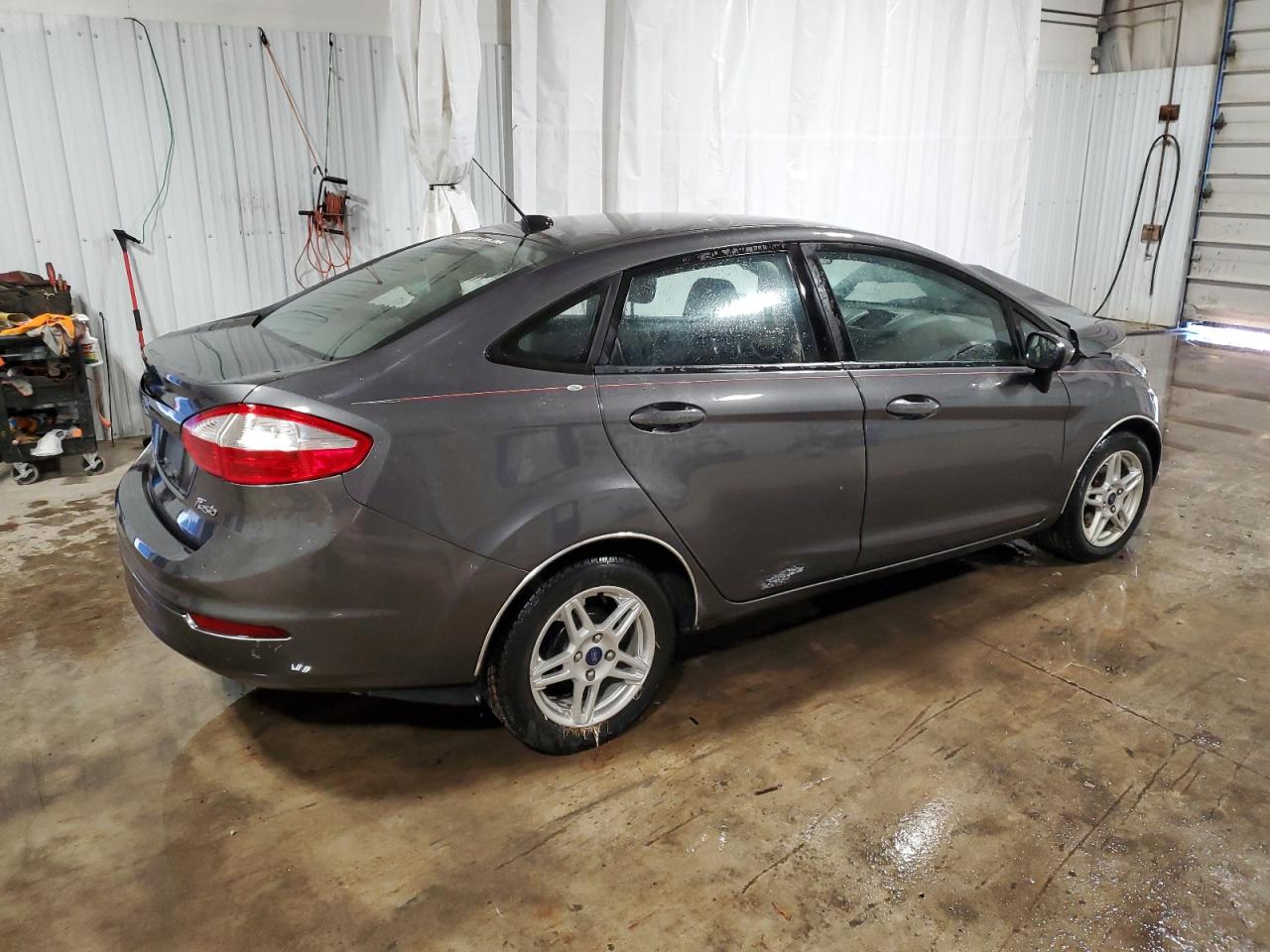 2019 Ford Fiesta VIN 3FADP4BJ9KM107578 Copart auction photo, front end / side damage thumbnail 3