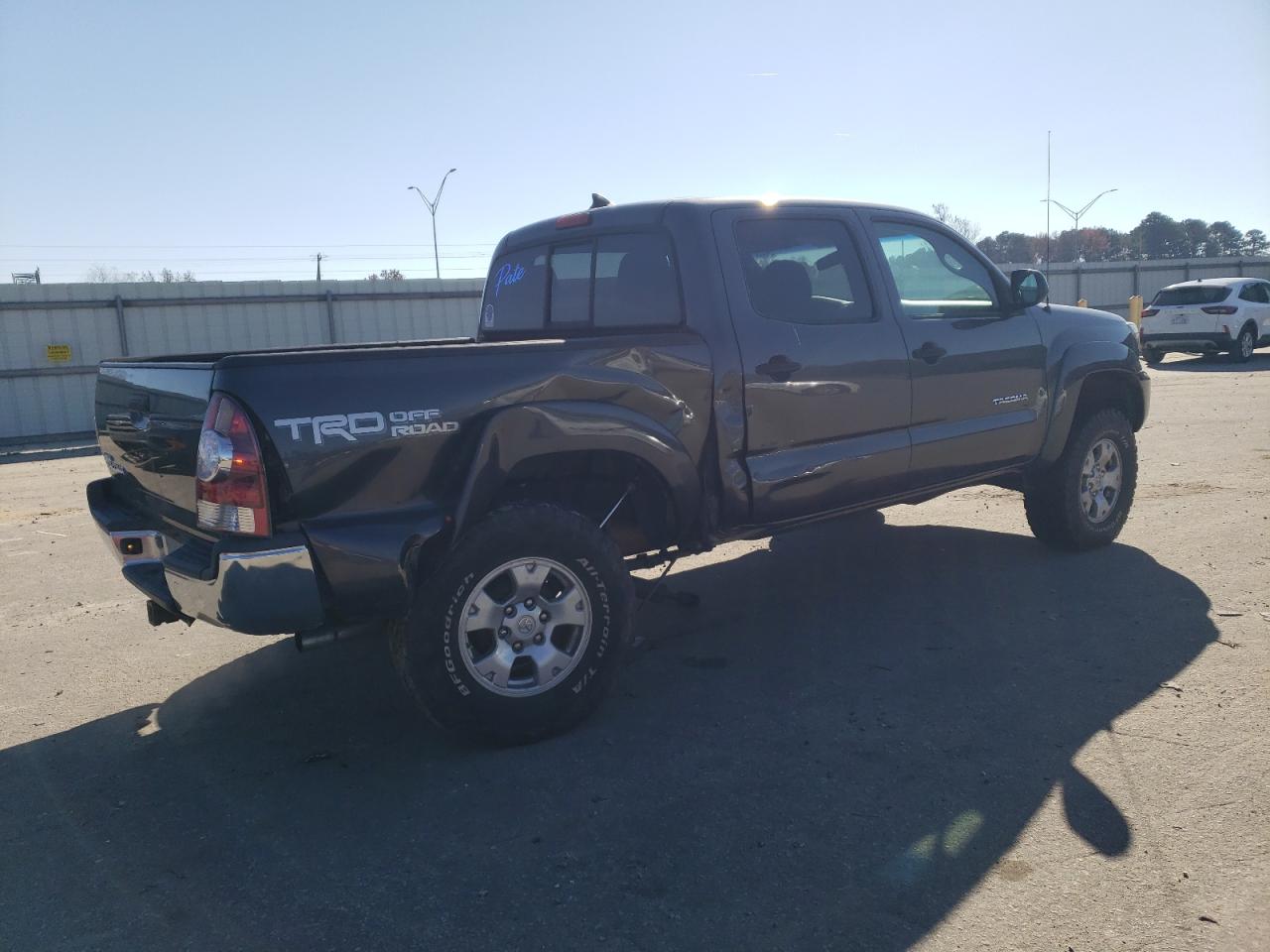 2014 Toyota Tacoma VIN 5TFLU4EN9EX093807 Copart auction photo, side damage thumbnail 3