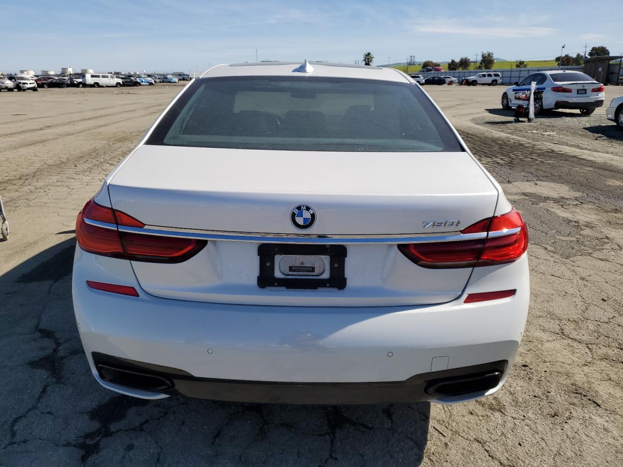 2016 BMW 7er VIN WBA7F0C55GGM20839 Copart auction photo, undercarriage damage thumbnail 6