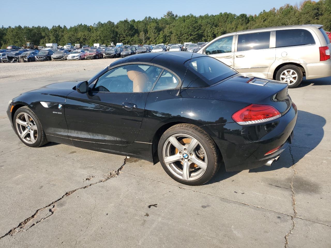 2011 BMW Z4 VIN WBALM5C59BE378391 Copart auction photo, water/flood damage thumbnail 2