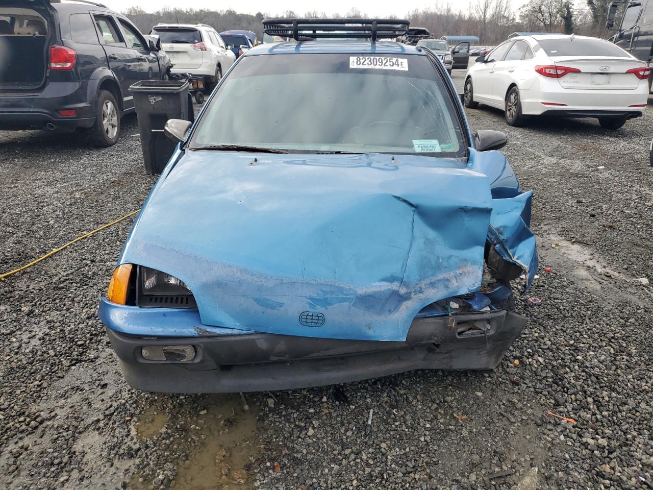 1990 GEO Metro VIN 2C1MR2465L6014681 Copart auction photo, front end damage thumbnail 5