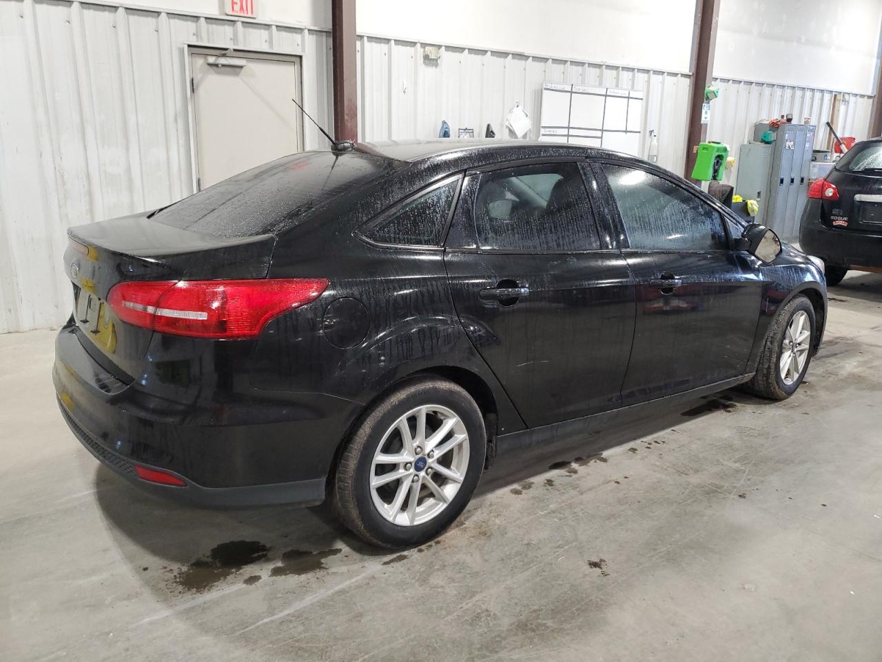 2015 Ford Focus VIN 1FADP3F28FL310689 Copart auction photo, minor dent/scratches damage thumbnail 3