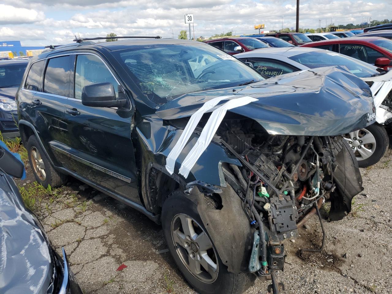 2011 Jeep Grand Cherokee VIN 1J4RR4GG3BC579472 Copart auction photo, front end damage thumbnail 4