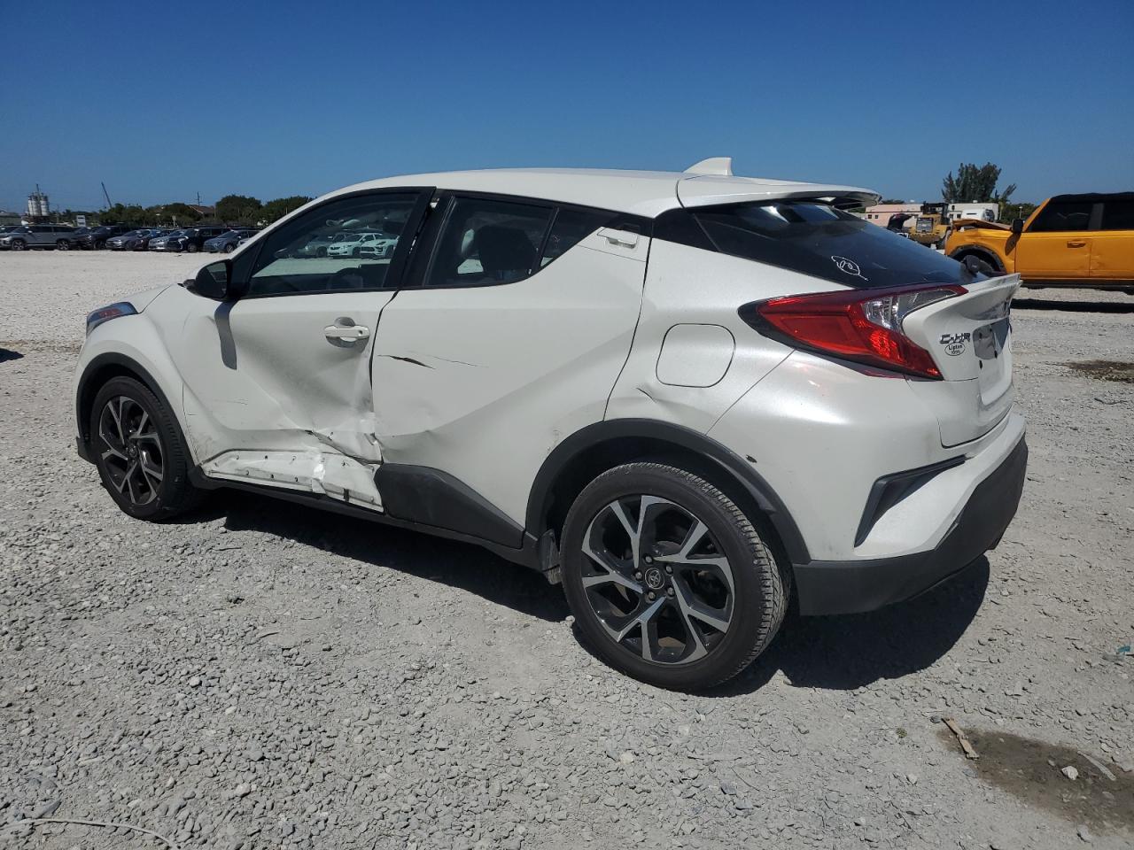 2019 Toyota C-HR VIN NMTKHMBX7KR096940 Copart auction photo, side damage thumbnail 2