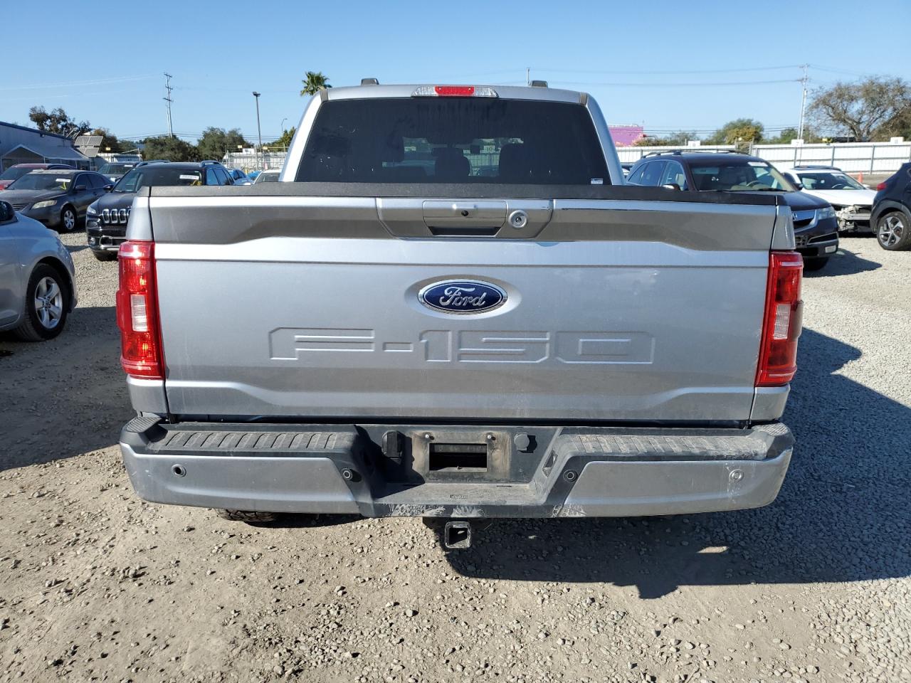 2023 Ford F-150 VIN 1FTFW1E54PFA63726 Copart auction photo, all over damage thumbnail 6