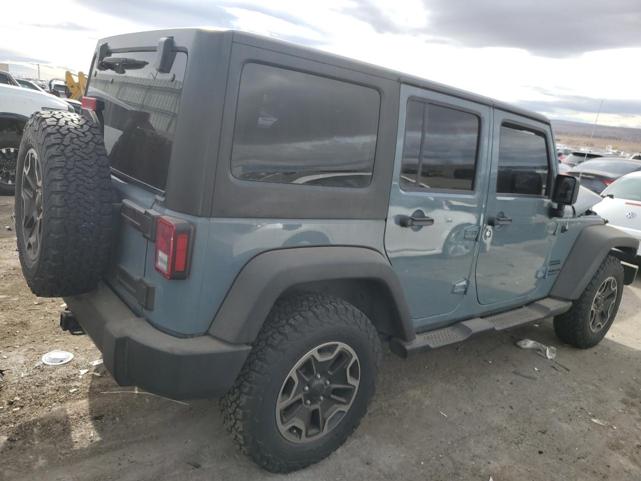 2015 Jeep Wrangler VIN 1C4BJWDG8FL712473 Copart auction photo, front end damage thumbnail 3