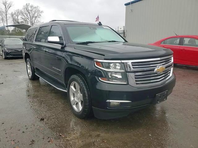 2017 Chevrolet Suburban VIN 1GNSCJKCXHR177327 Copart auction photo, water/flood damage thumbnail 14