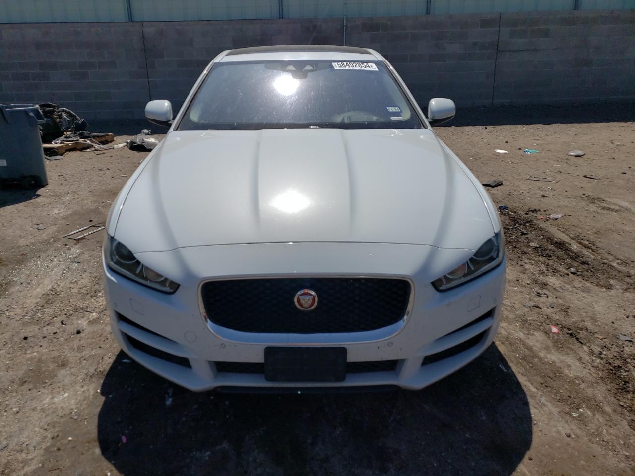 2017 Jaguar XE VIN SAJAH4BV0HA946894 Copart auction photo, side damage thumbnail 5