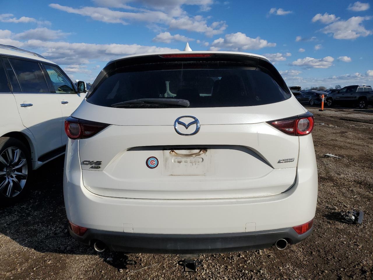 2018 Mazda CX-5 VIN JM3KFBCM1J0306103 Copart auction photo, side / front end damage thumbnail 6