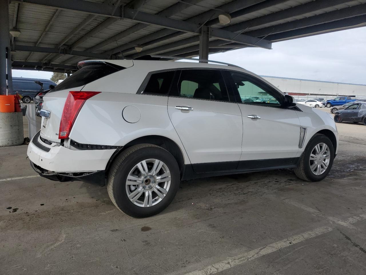 2013 Cadillac SRX VIN 3GYFNCE37DS529793 Copart auction photo, rear end damage thumbnail 3
