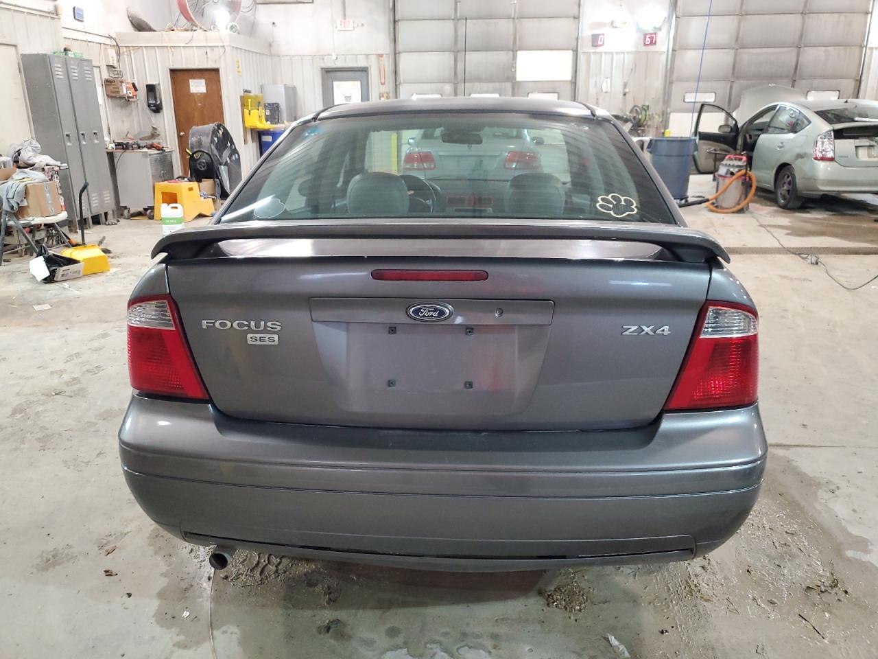 2006 Ford Focus VIN 1FAFP34N66W169254 Copart auction photo, rear end / side damage thumbnail 6