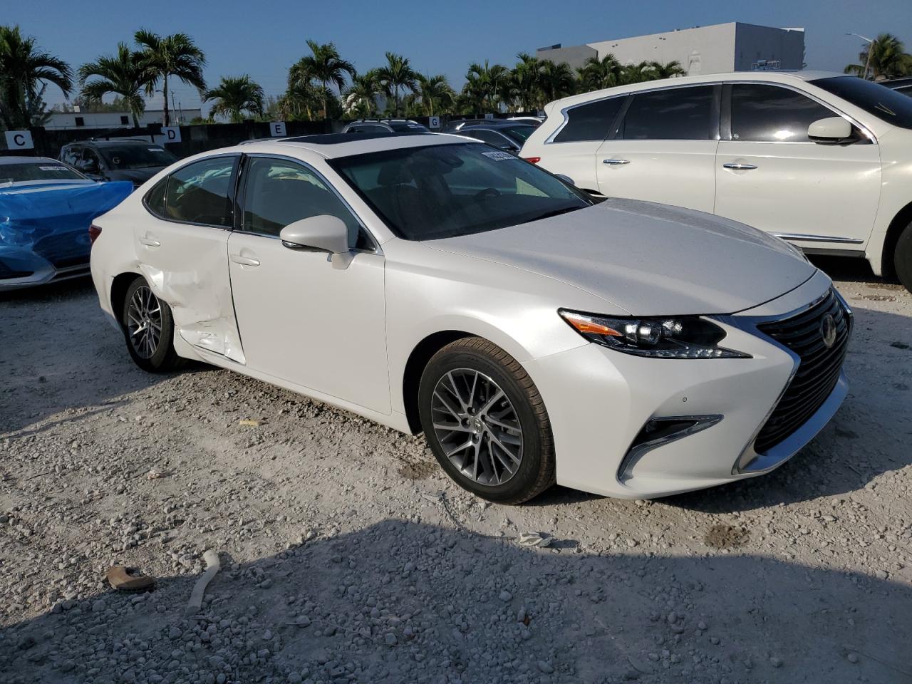 2016 Lexus ES VIN JTHBK1GG4G2244114 Copart auction photo, side / front end damage thumbnail 4