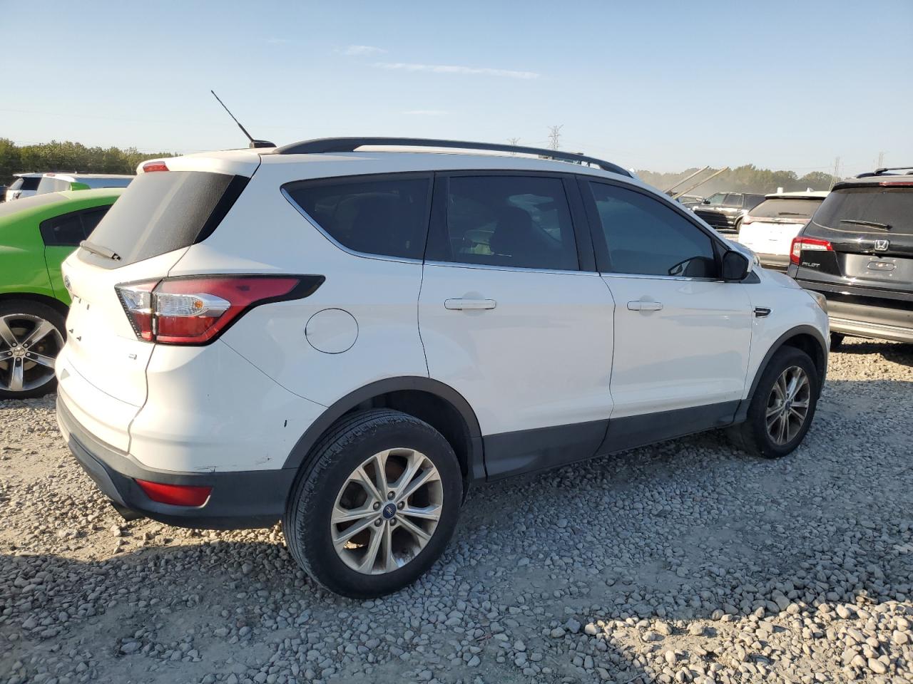 2018 Ford Escape VIN 1FMCU9GD9JUB37118 Copart auction photo, normal wear / side damage thumbnail 3