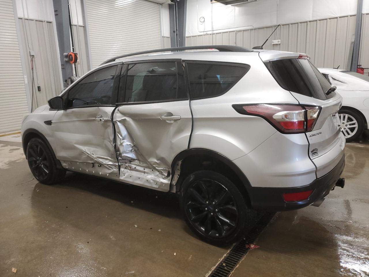 2017 Ford Escape VIN 1FMCU9J9XHUE23798 Copart auction photo, side damage thumbnail 2