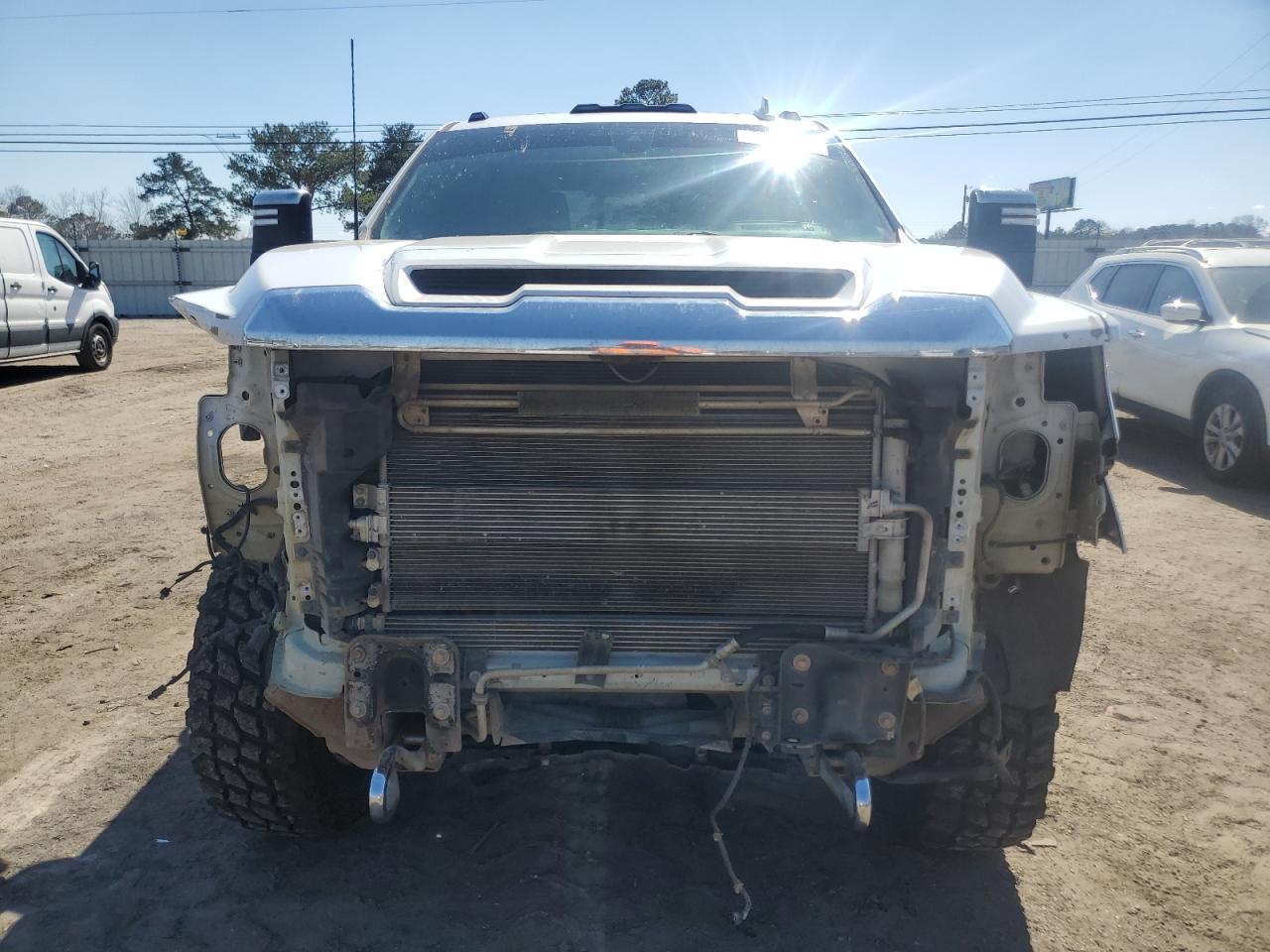 2021 GMC Sierra VIN 1GT49REY2MF123232 Copart auction photo, front end / side damage thumbnail 5
