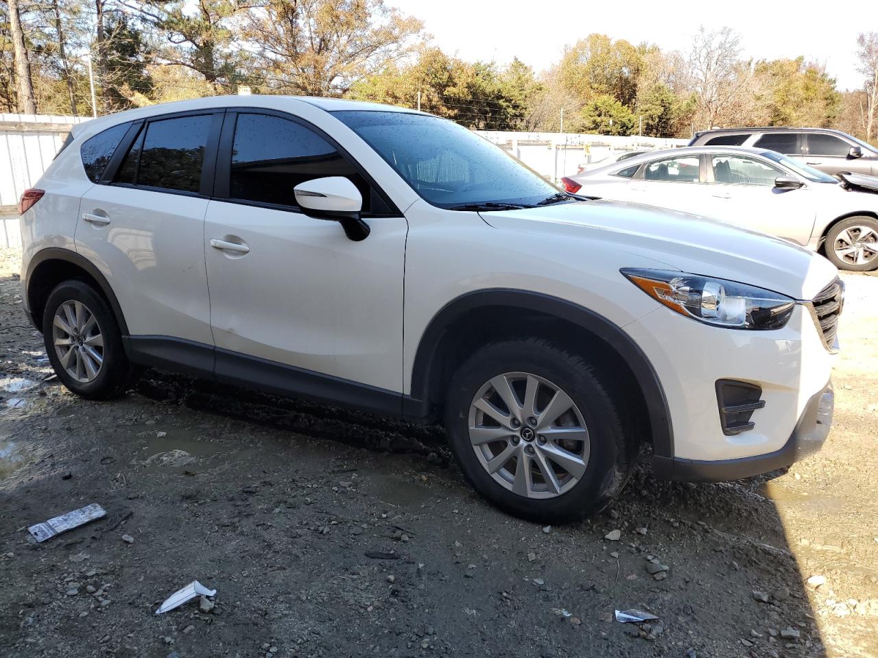 2016 Mazda CX-5 VIN JM3KE4BY8G0606796 Copart auction photo, all over damage thumbnail 4