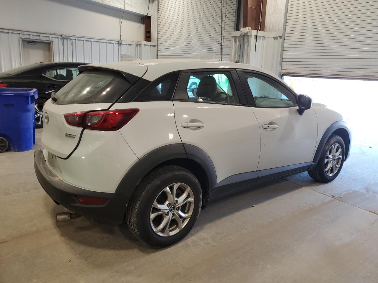 2016 Mazda CX-3 VIN JM1DKBC71G0124045 Copart auction photo, rear end / side damage thumbnail 3
