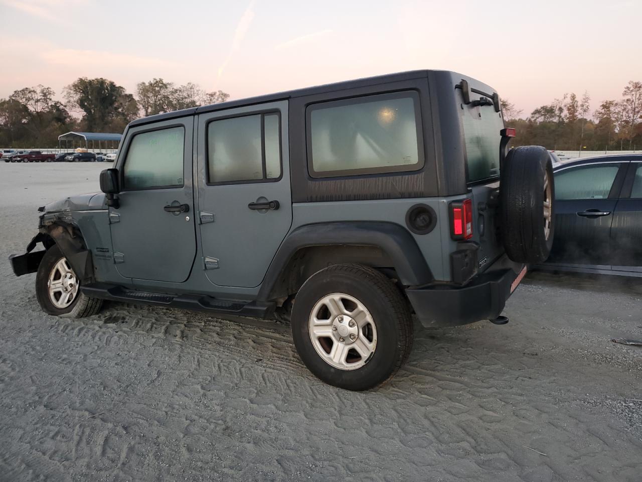 2015 Jeep Wrangler VIN 1C4BJWKG9FL599488 Copart auction photo, front end / undercarriage damage thumbnail 2