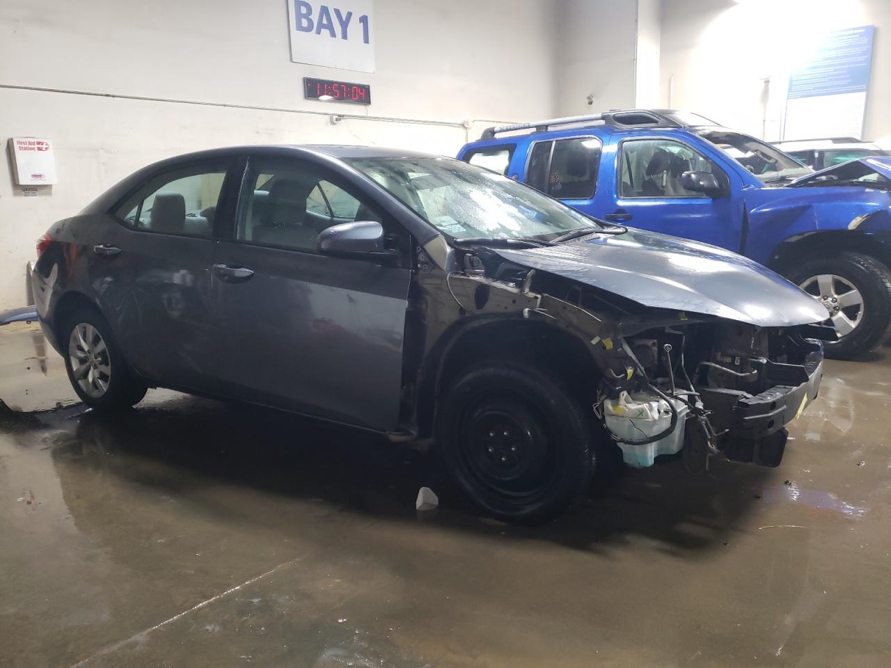 2015 Toyota Corolla VIN 5YFBURHE7FP281794 Copart auction photo, front end / side damage thumbnail 4