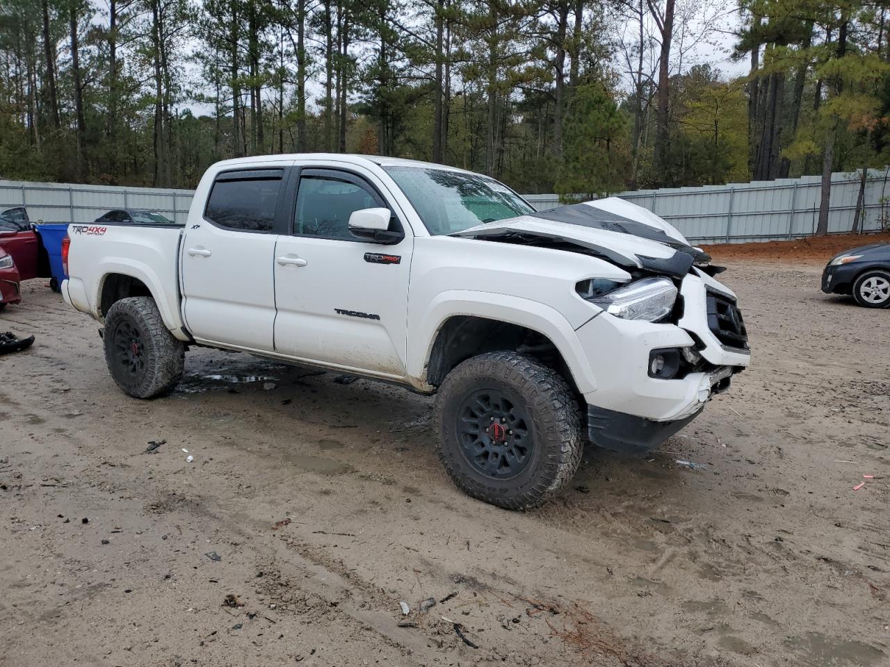 2022 Toyota Tacoma VIN 3TMCZ5AN6NM512182 Copart auction photo, front end damage thumbnail 4