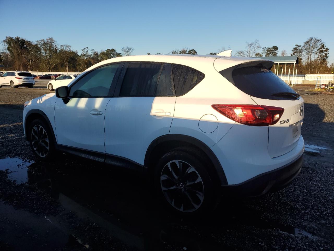 2016 Mazda CX-5 VIN JM3KE2DY4G0840547 Copart auction photo, side damage thumbnail 2