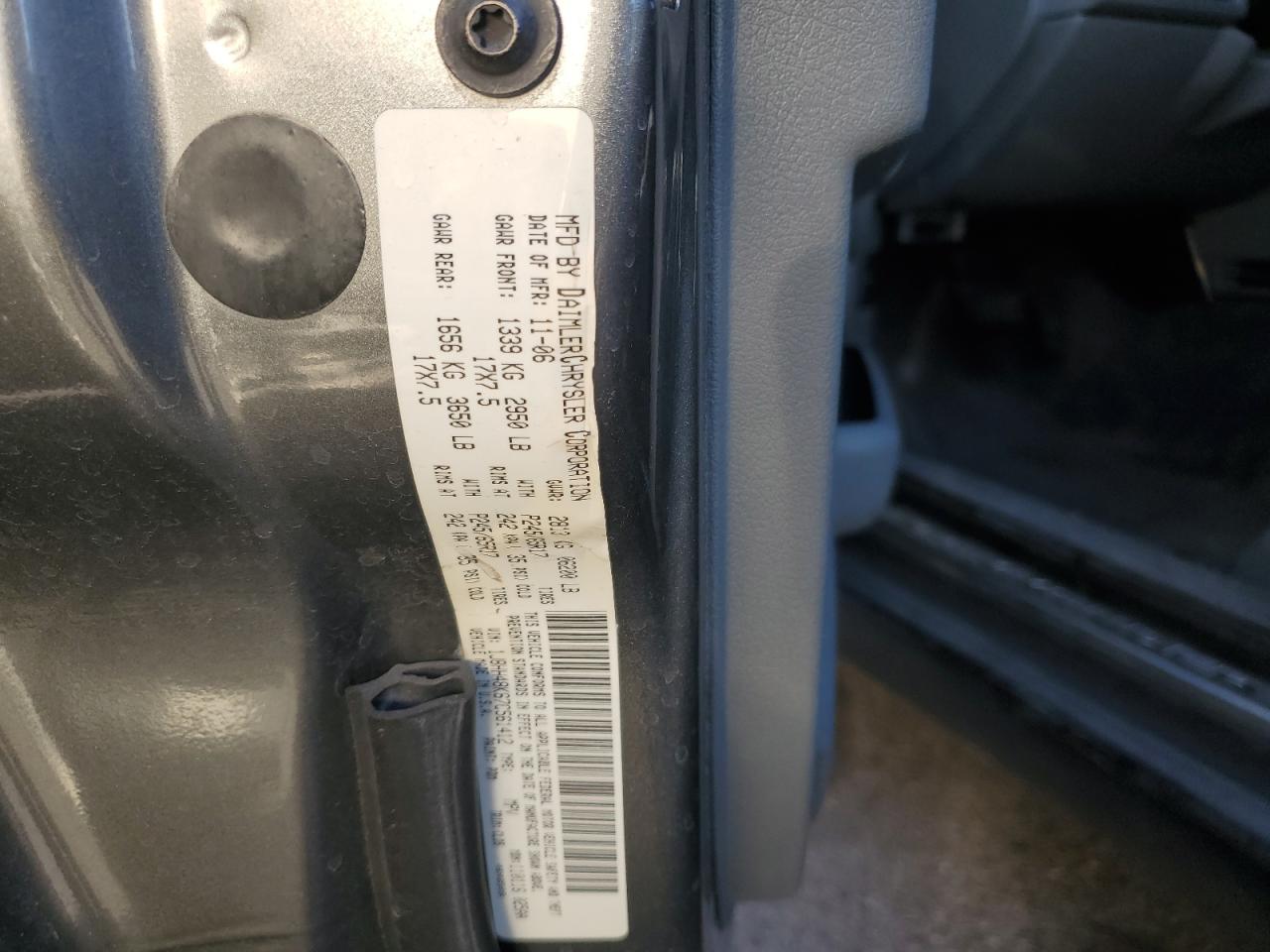 2007 Jeep Commander VIN 1J8HH48K67C561412 Copart auction photo, side damage thumbnail 13