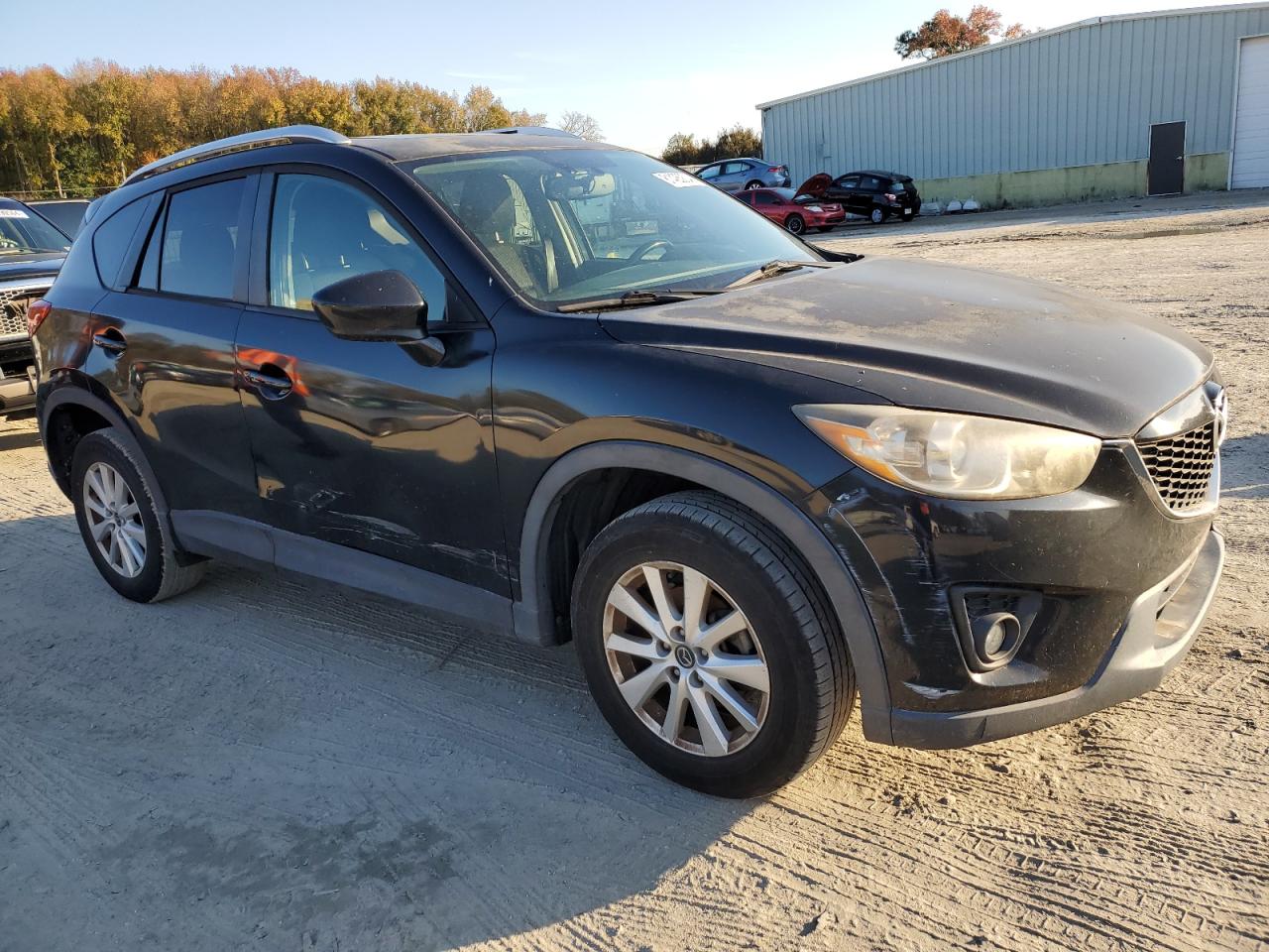 2013 Mazda CX-5 VIN JM3KE4CE4D0111981 Copart auction photo, side / minor dent/scratches damage thumbnail 4