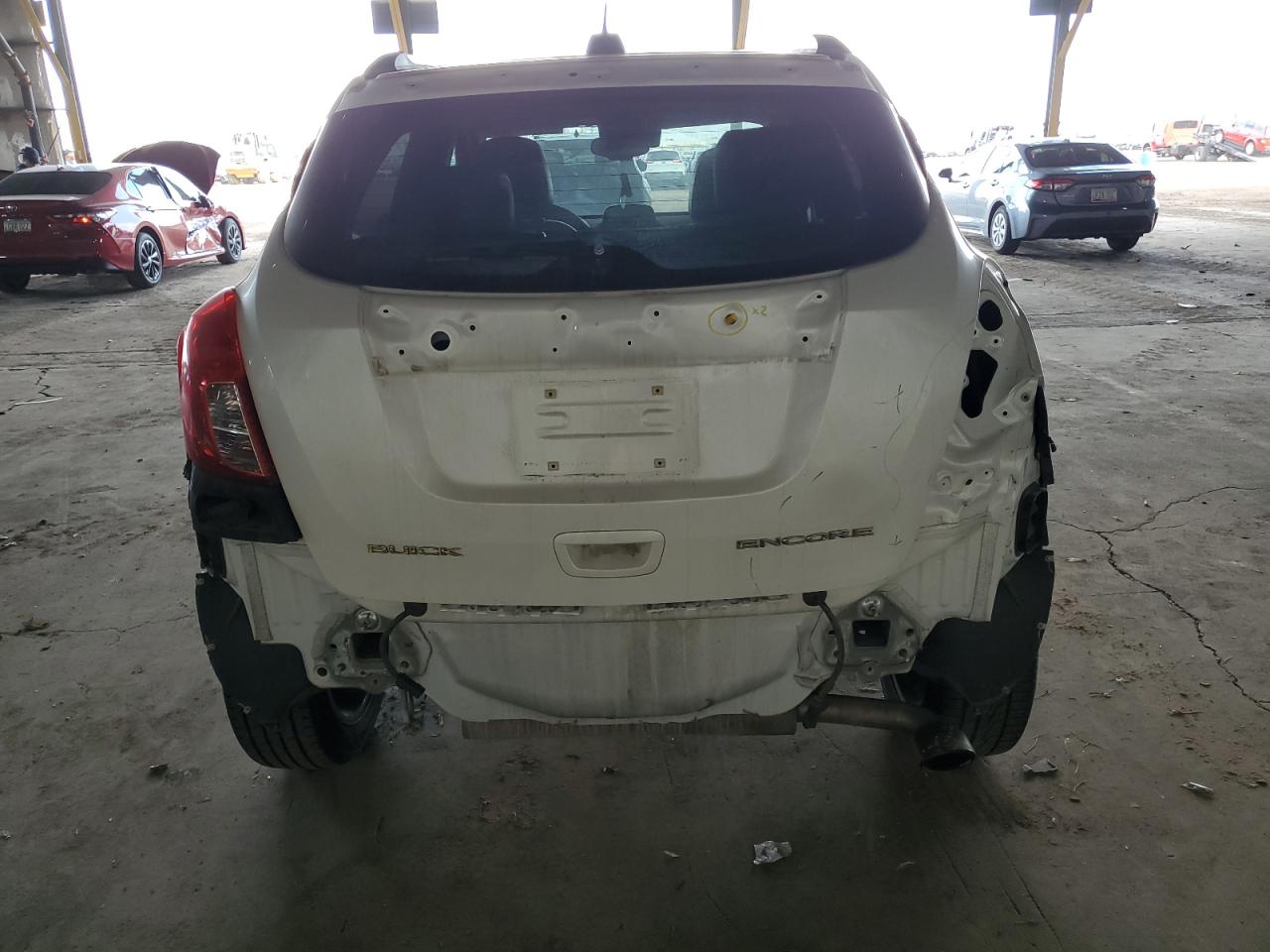 2015 Buick Encore VIN KL4CJDSB6FB259549 Copart auction photo, rear end / minor dent/scratches damage thumbnail 6