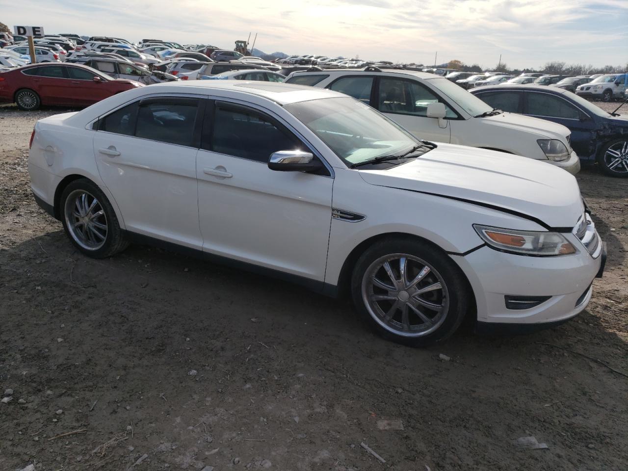 2012 Ford Taurus VIN 1FAHP2FW1CG113835 Copart auction photo, front end / minor dent/scratches damage thumbnail 4