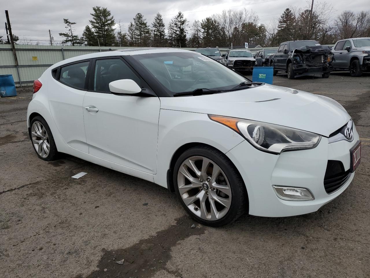 2015 Hyundai Veloster VIN KMHTC6AD4FU221204 Copart auction photo, vandalism damage thumbnail 4