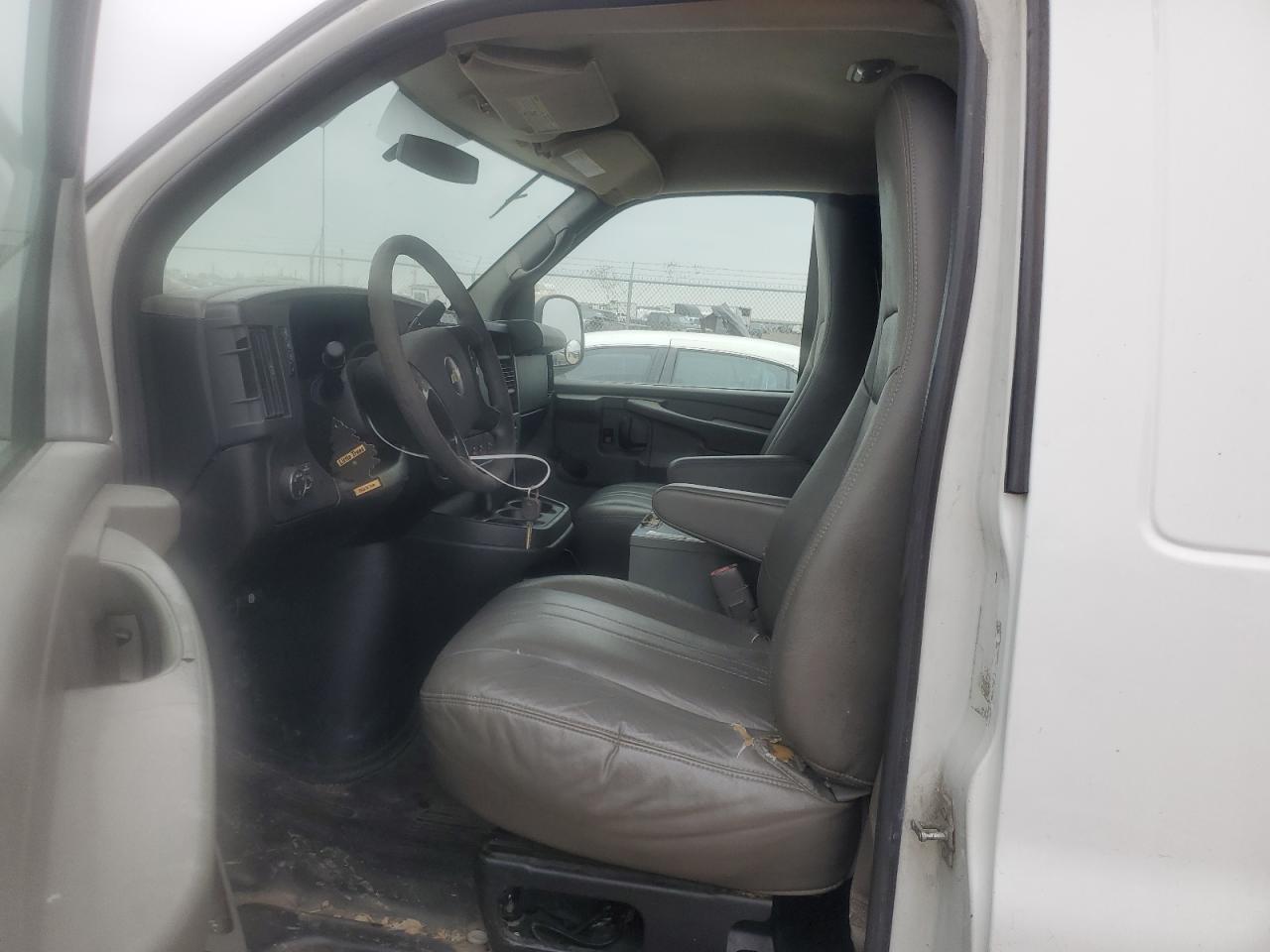 2012 Chevrolet Express VIN 1GCWGFCG4C1190529 Copart auction photo, side / front end damage thumbnail 7