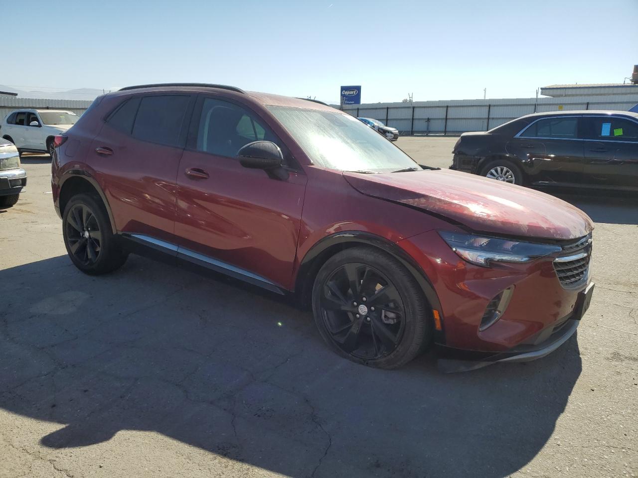 2021 Buick Envision VIN LRBAZLR44MD099985 Copart auction photo, front end / side damage thumbnail 4