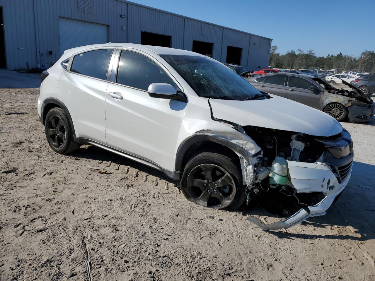 2020 Honda HR-V VIN 3CZRU5H32LM702212 Copart auction photo, front end / side damage thumbnail 4