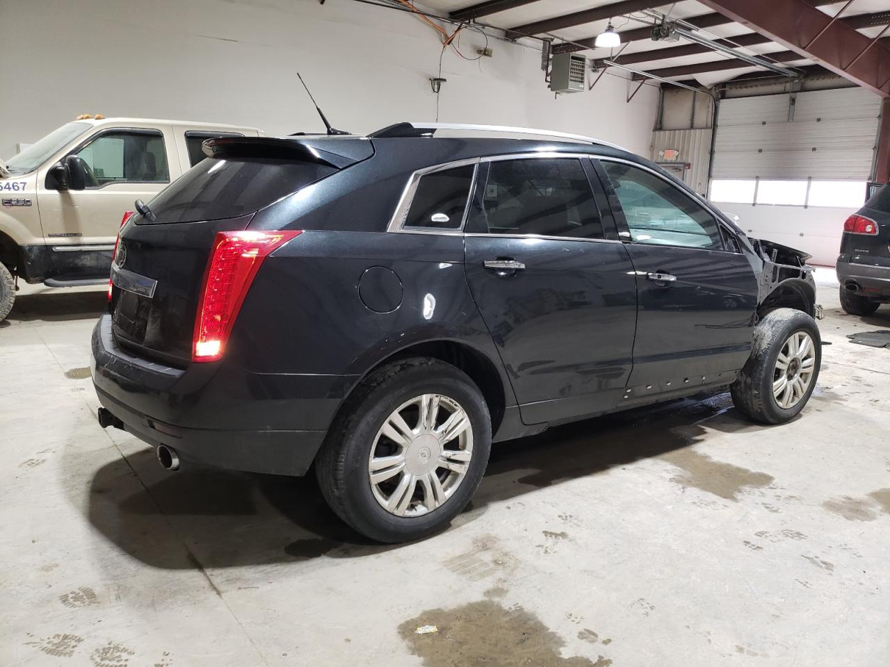 2011 Cadillac SRX VIN 3GYFNAEY3BS595013 Copart auction photo, front end damage thumbnail 3