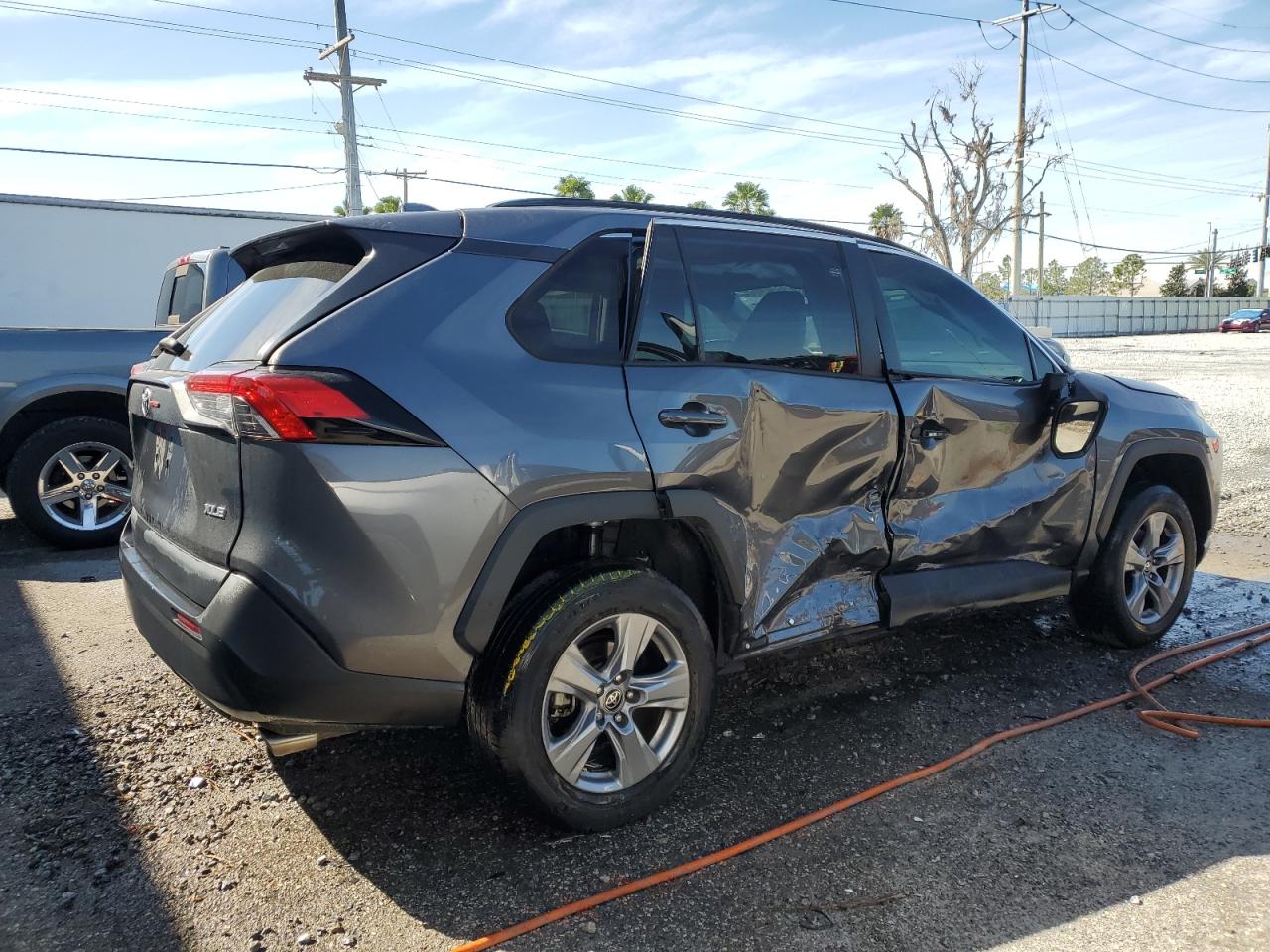 2022 Toyota RAV 4 VIN 2T3W1RFV9NC176483 Copart auction photo, side damage thumbnail 3