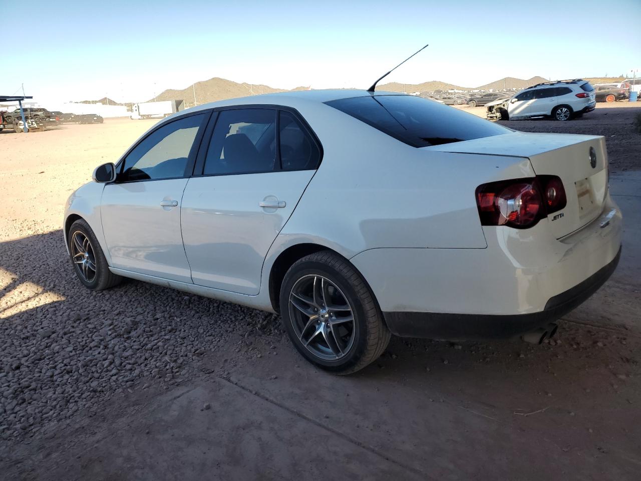 2010 Volkswagen Jetta VIN 3VWJZ7AJ8AM089063 Copart auction photo, side / rear end damage thumbnail 2