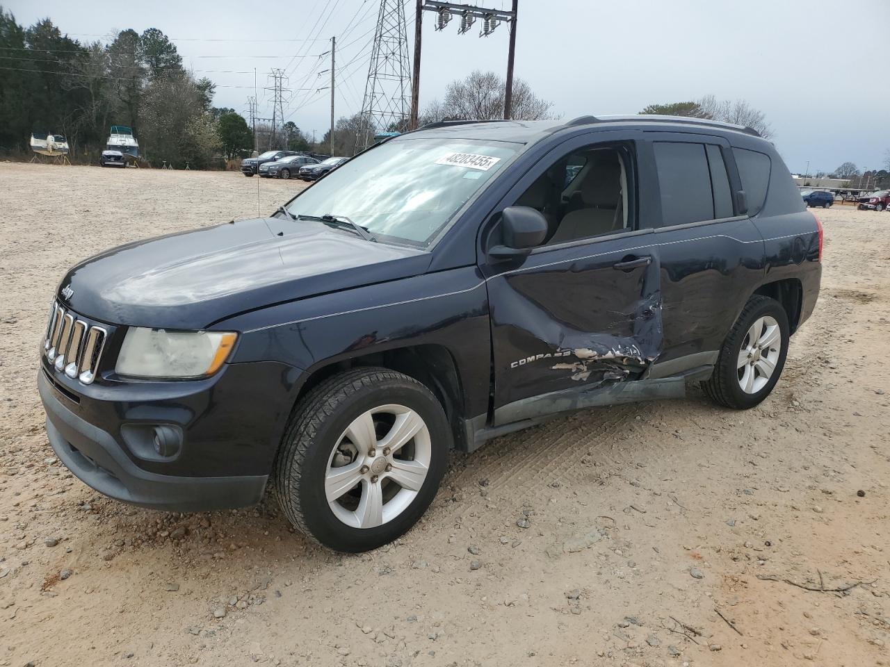 2011 Jeep Compass VIN 1J4NT1FB9BD208248