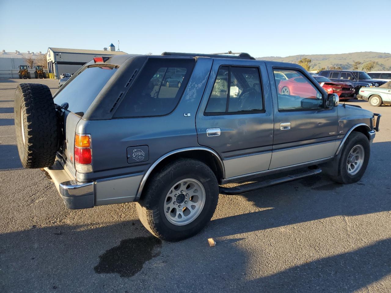 1995 Isuzu Rodeo VIN 4S2CM58V2S4361566 Copart auction photo, minor dent/scratches damage thumbnail 3